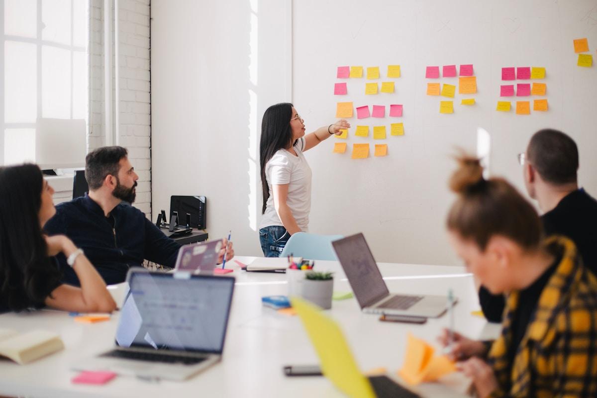 Professional presenting financial analysis in a meeting room